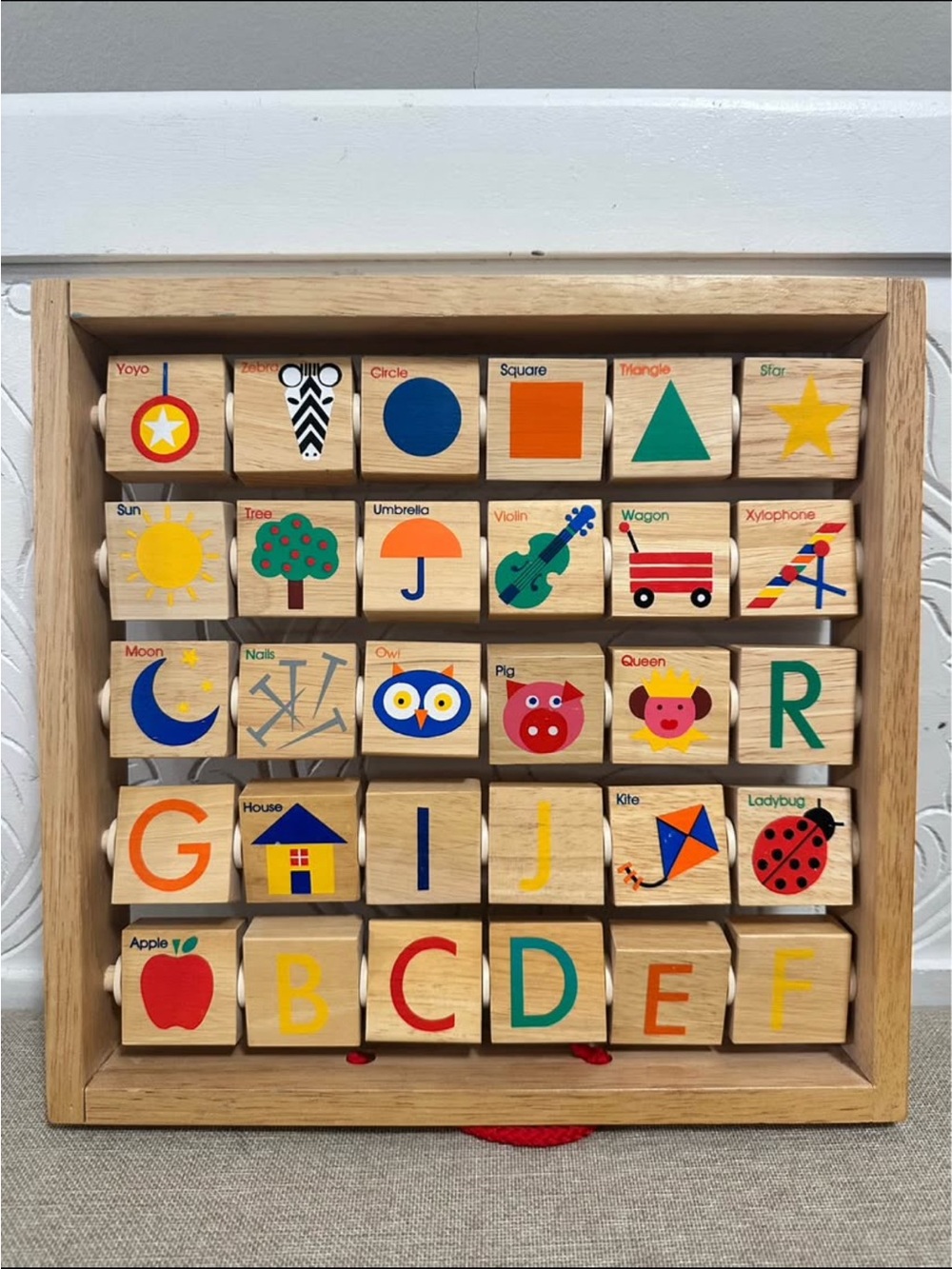 Wooden alphabet abacus